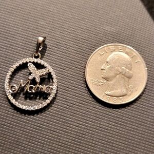 14k white gold fill over brass Mama/butterfly pendant.